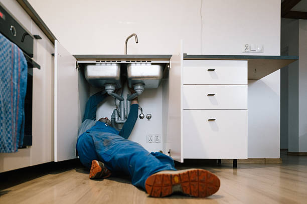 Professional Emergency Plumber technician working in Clayton, DE